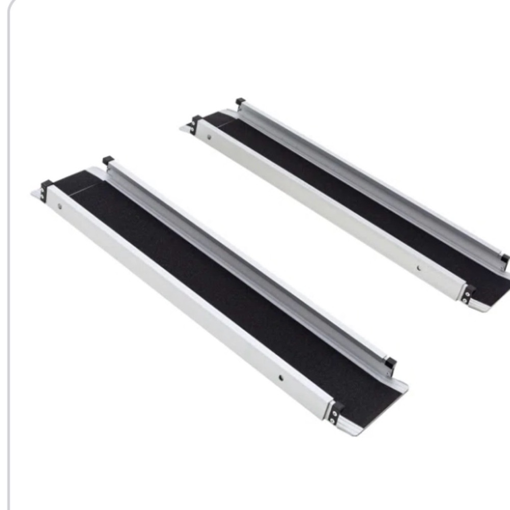 Travel Buggy Aluminum Telescopic Ramp. Never been used, still in box.